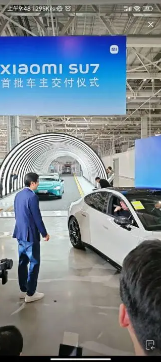 Xiaomi Founder Lei Jun personally delivers first batch of SU7 cars in Beijing ceremony